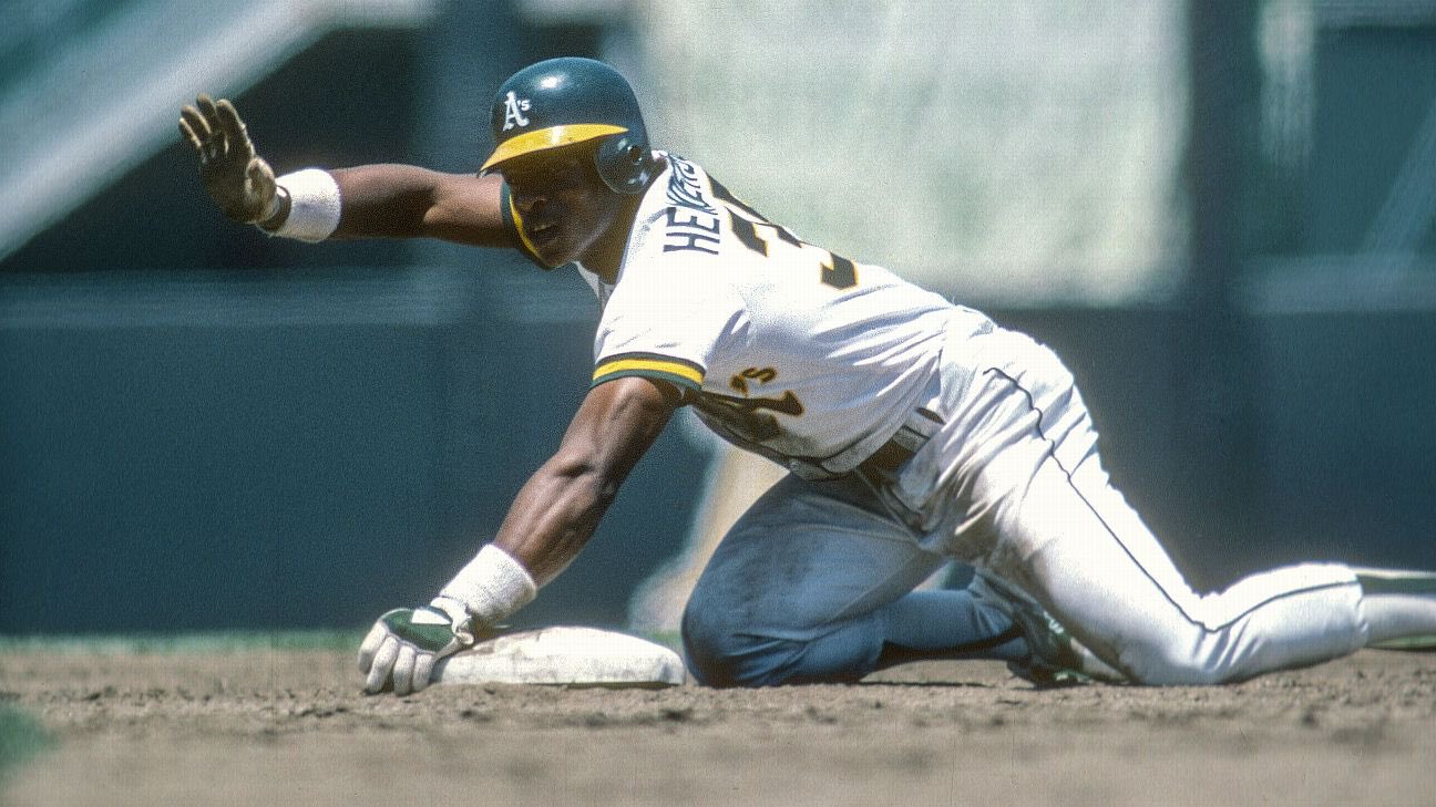 Rickey Henderson en su especialidad: el robo de bases. 