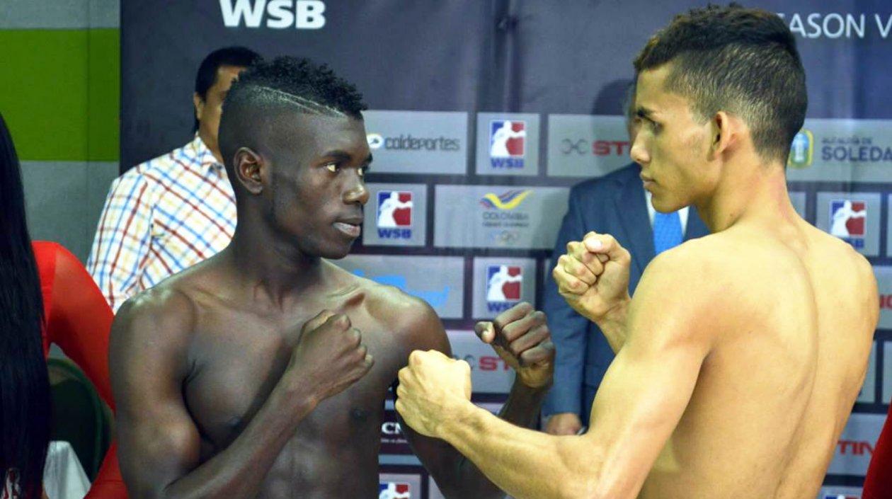 El boxeador colombiano Yuberjen Martínez frente a su rival, el venezolano Luis Polanco.