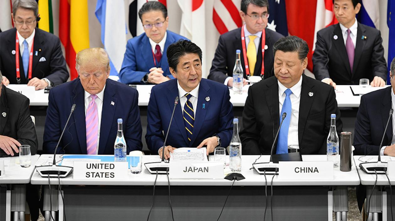 El presidente de Estados Unidos, Donald Trump; el primer ministro de Japón, Shinzō Abe, y el líder chino, Xi Jinping,