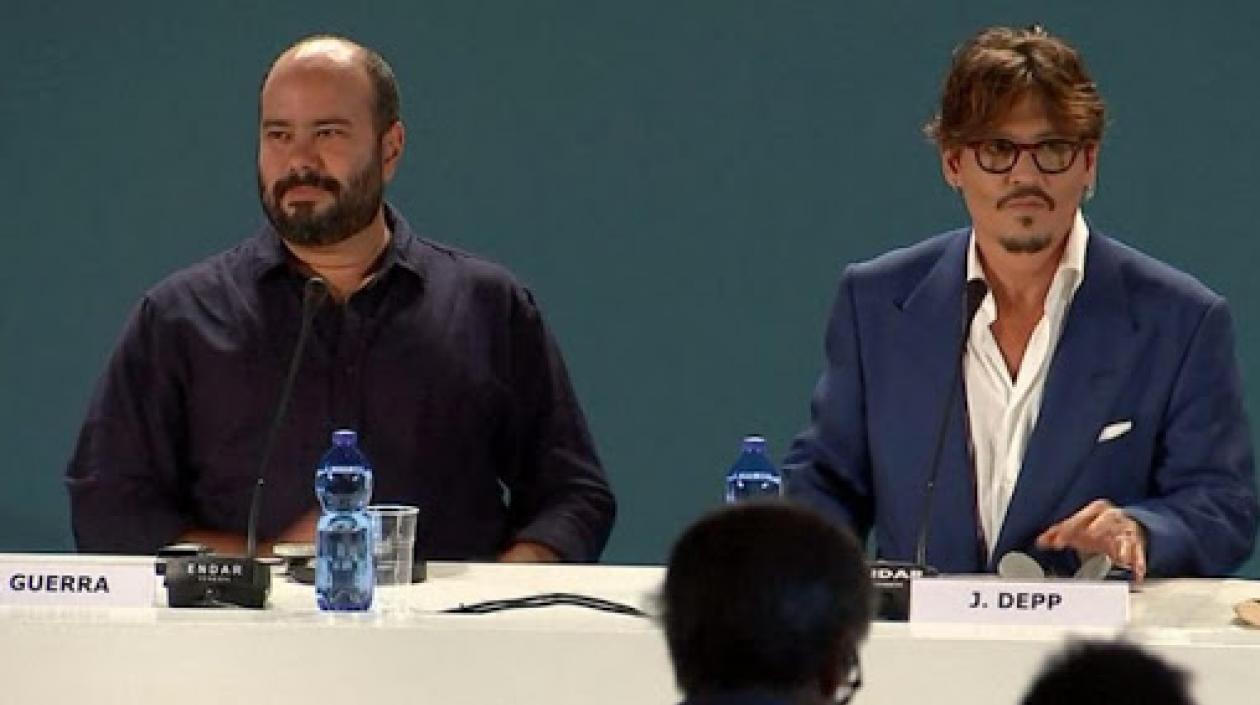 El cineasta colombiano Ciro Guerra y el actor estadounidense Johnny Depp.