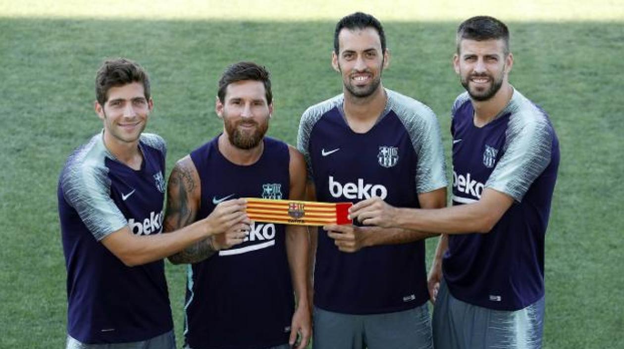 Sergi Roberto, Messi, Busquets y Piqué.