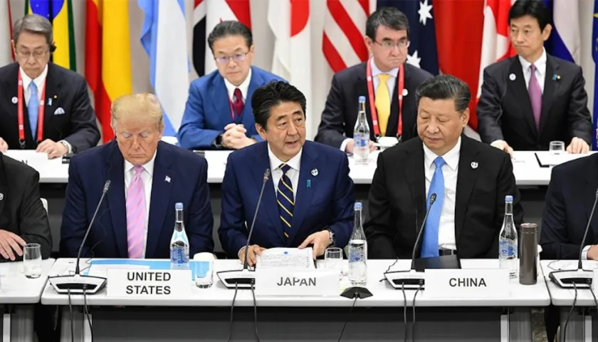 El presidente de Estados Unidos, Donald Trump; el primer ministro de Japón, Shinzō Abe, y el líder chino, Xi Jinping,
