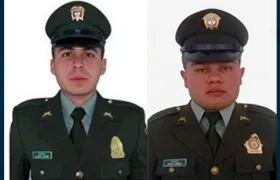 Álvaro Iván Marín Marín y Juan Carlos Barreto Guzmán, agentes asesinados.