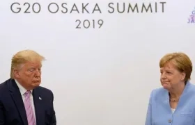 Donald Trump y Angela Merkel.