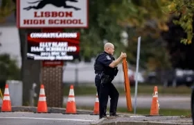 La Policía monta guardia para hallar al sospechoso del tiroteo masivo en Lisboa, Maine