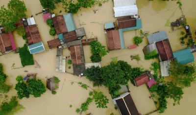 Vista de la situación en la comunidad de Hoang Van Thu, distrito de Chuong My, en Hanoi (Vietnam),  por las inundaciones causadas por las fuertes lluvias caídas. 