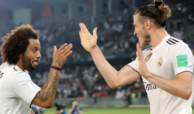 Marcelo y Gareth Bale celebran tras una anotación. 