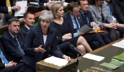 Fotografía cedida por el Parlamento del Reino Unido, de la primera ministra británica, Theresa May, en un momento de su intervención en la Cámara de los Comunes británica en Westminster.
