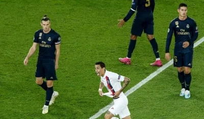 Ángel Di Maria celebra tras anotar un gol, ante la mirada de Gareth Bale y James Rodríguez.