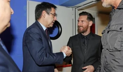 Josep Maria Bartomeu y Lionel Messi.