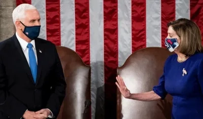 El vicepresidente Mike Pence y Nancy Pelosi.