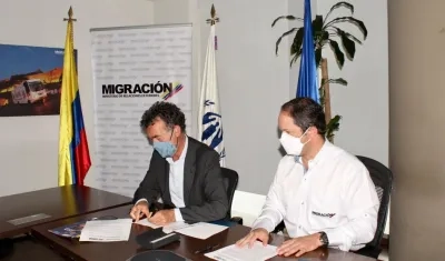  Jozef Merkx, representante de Acnur en Colombia, y Juan Francisco Espinosa, director General de Migración Colombia.