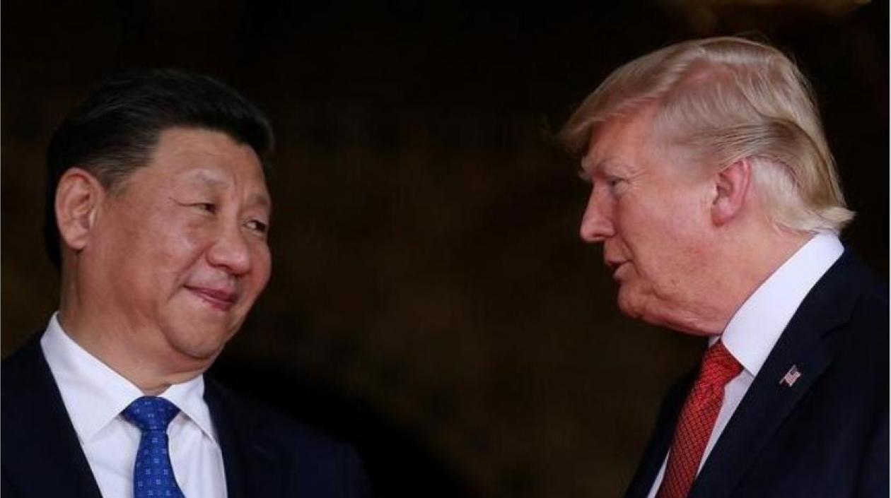 El presidente de China Xi Jinping y su par estadounidense Donald Trump.
