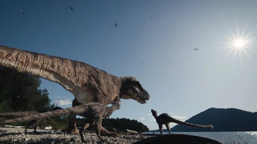 Tiranousario Rex y sus crías junto a un lago.