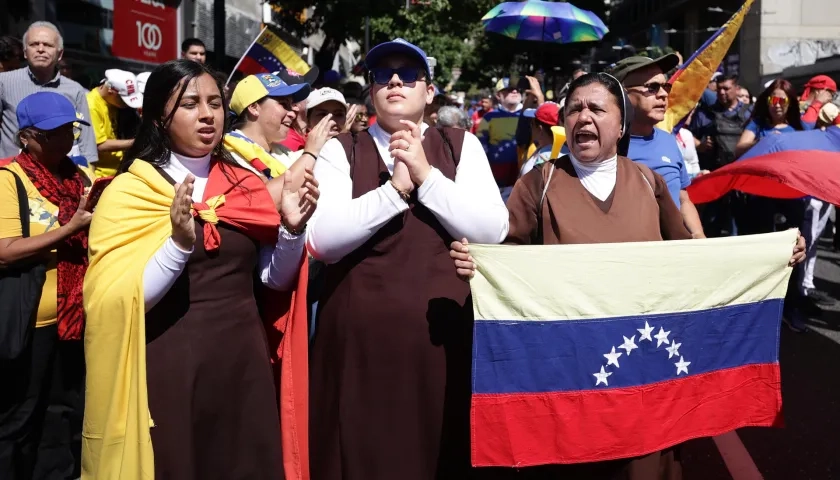 Venezolanos opositores en una manifestación, en Caracas.