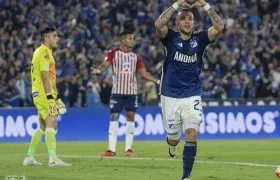 Leonardo Castro festeja tras marcar el primer gol de Millonarios. 