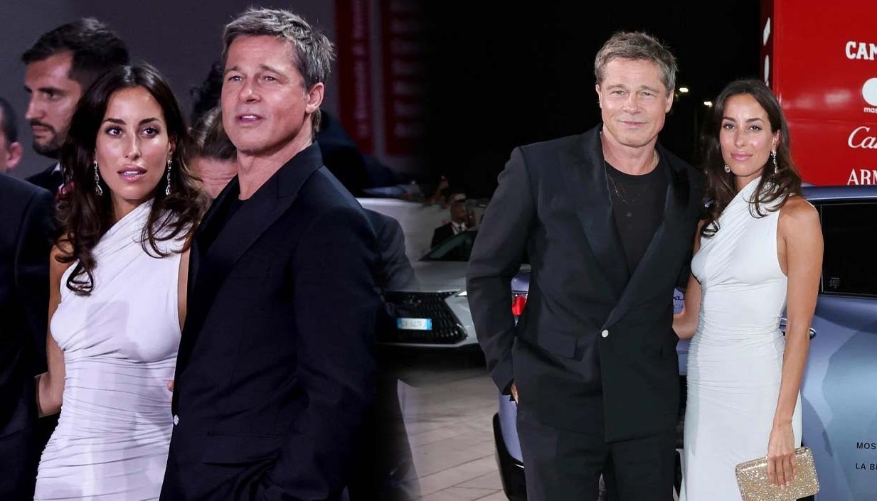 Brad Pitt junto a su novia Inés De Ramón en la alfombra roja del Festival Internacional de Cine de Venecia. 