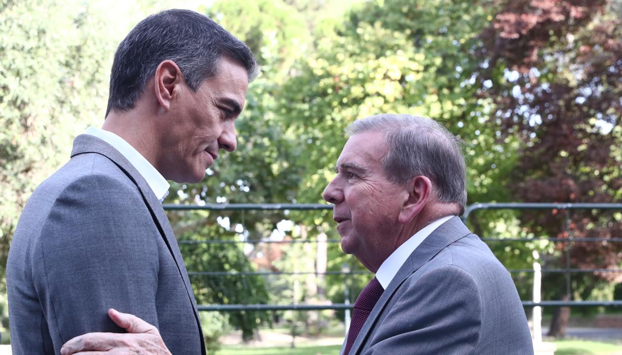 Pedro Sánchez y Edmundo González.