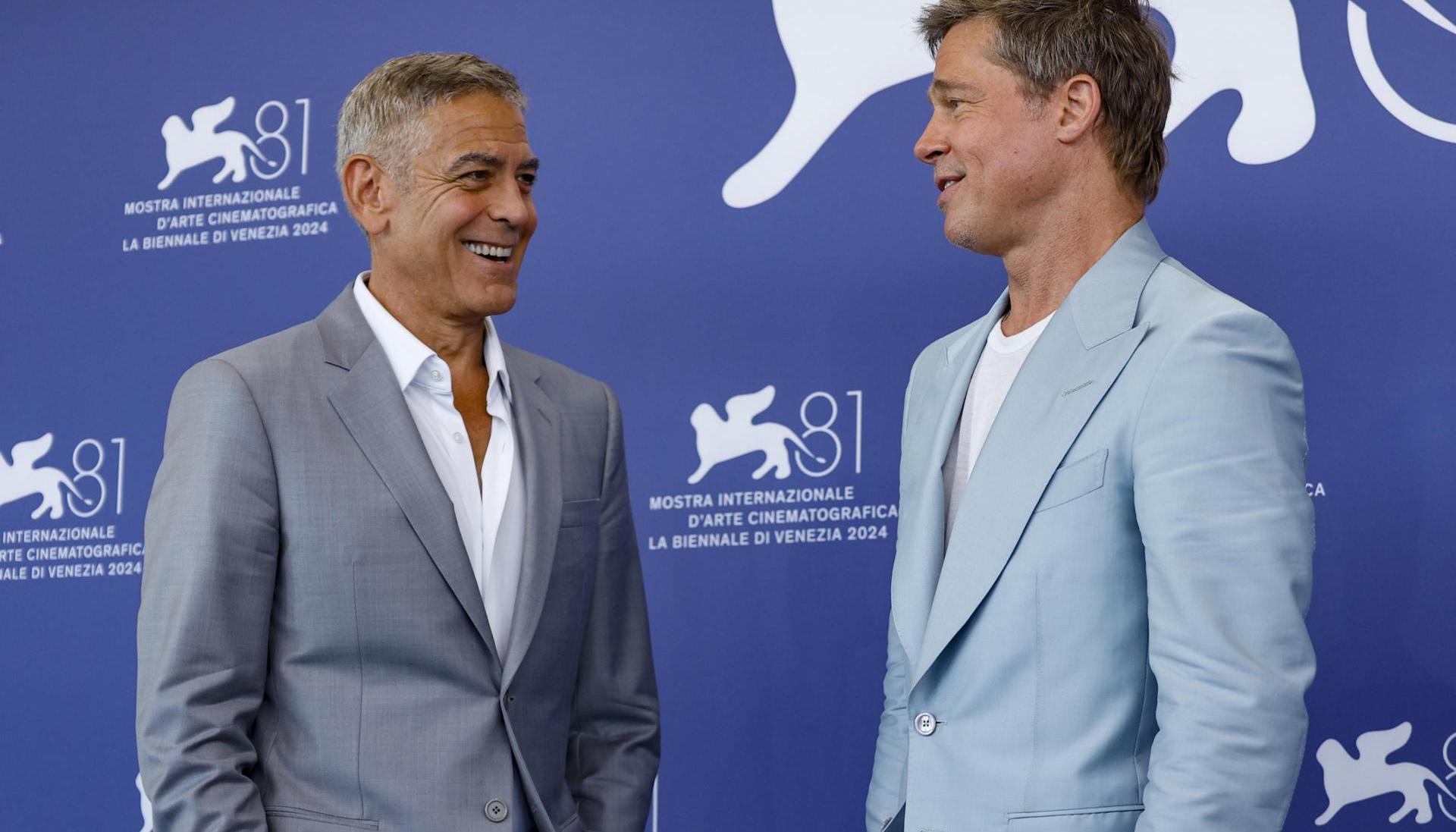 Los famosos posan en una sesión fotográfica del Festival Internacional de Cine de Venecia.