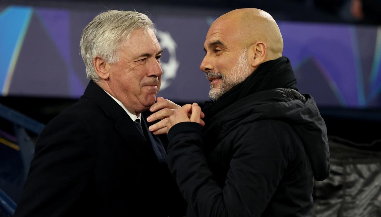 Carlo Ancelotti, técnico del Real Madrid, y Pep Guardiola, entrenador del Manchester City.