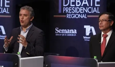 Iván Duque y Gustavo Petro, durante un debate.