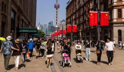 Turistas chinos en las calles de Shangai. 