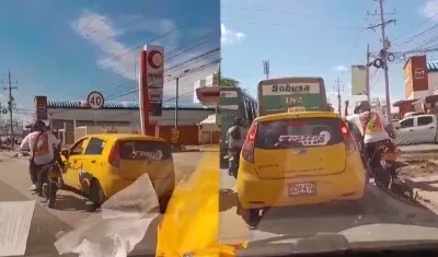 Cobradiario patea un taxi y le destruye retrovisor 